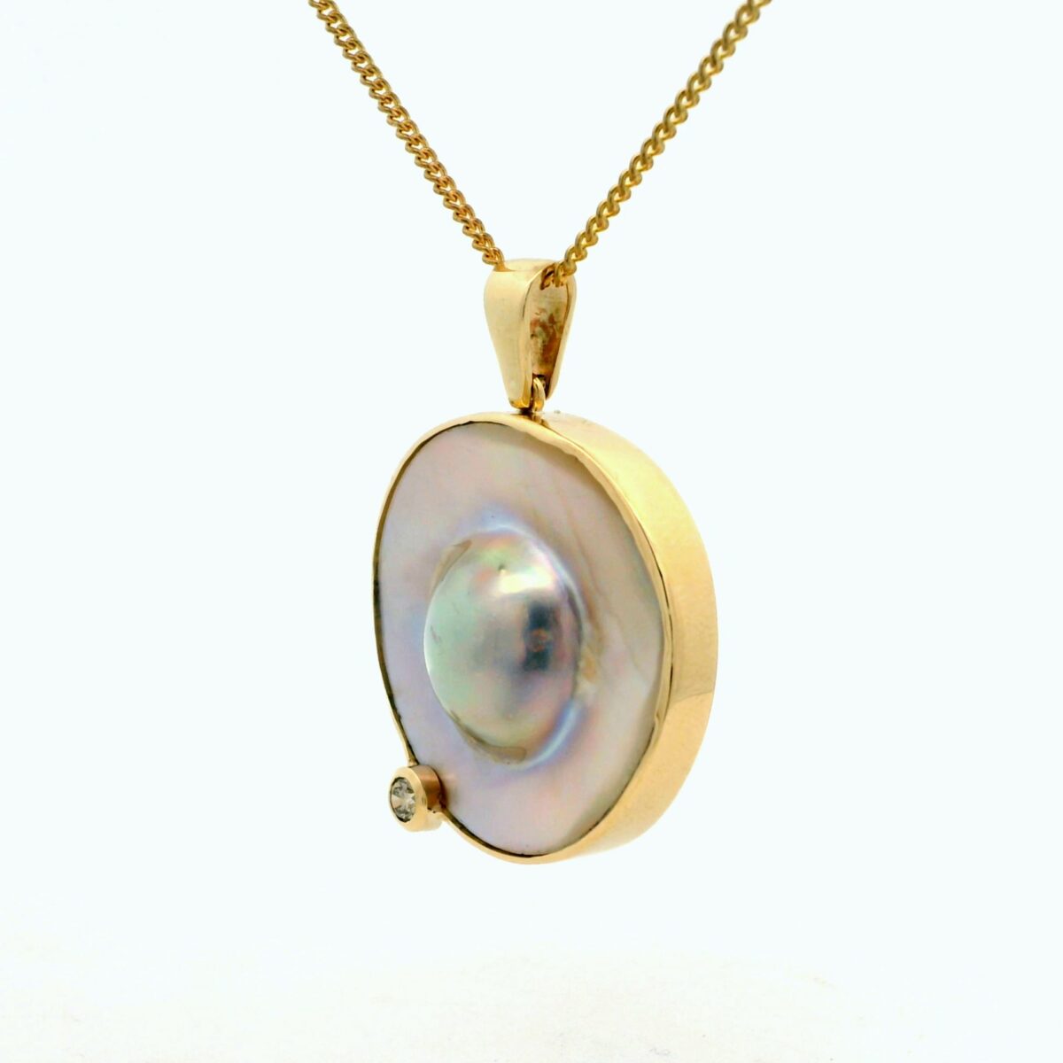 MABE PEARL PENDANT WITH ARGYLE CHAMP DIAMOND_1